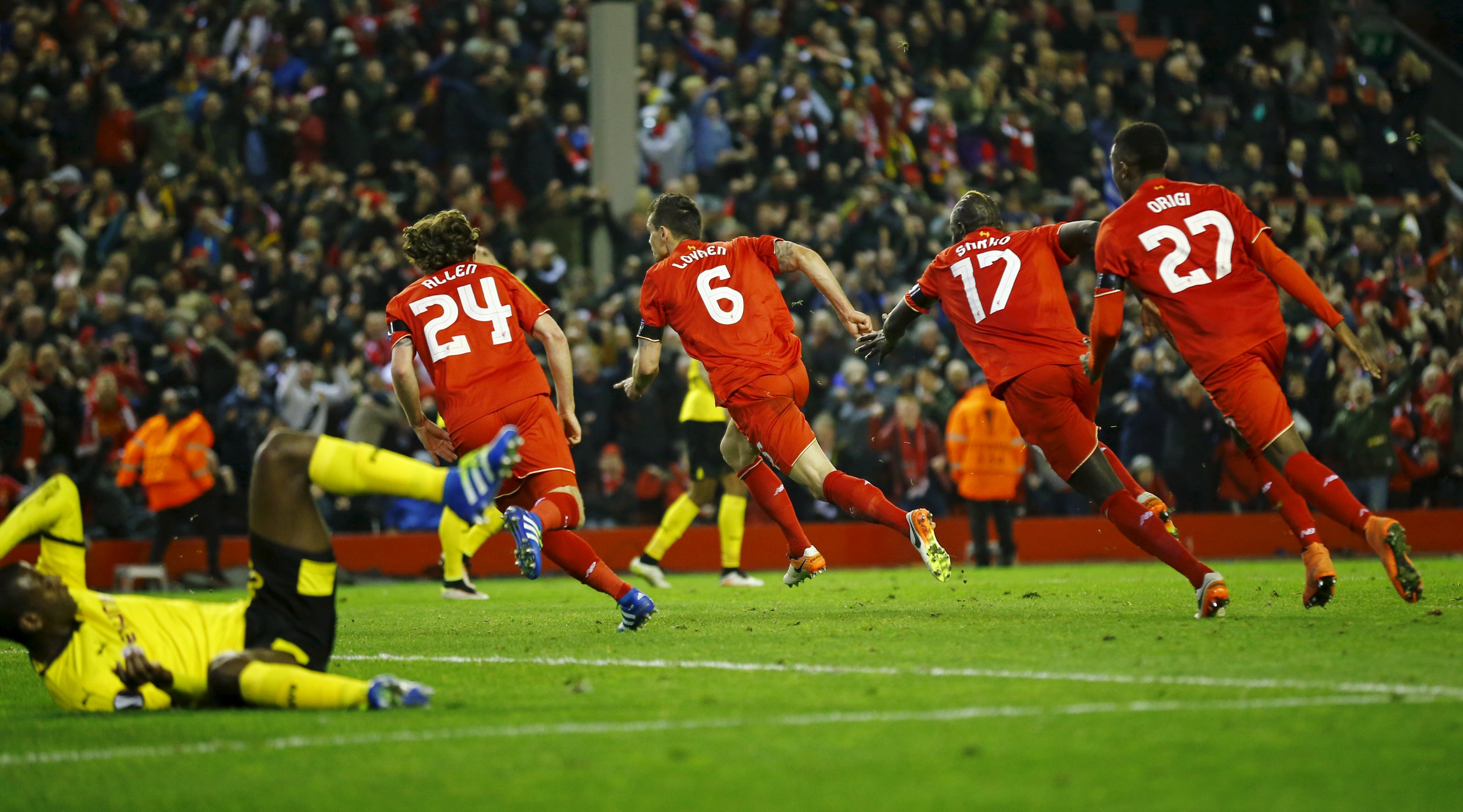 Football Soccer - Liverpool v Borussia Dortmund - UEFA Europa League Quarter Final Second Leg - Anfield, Liverpool, England - 14/4/16Liverpool's Dejan Lovren celebrates scoring their fourth goal with teammatesReuters / Darren StaplesLivepicEDITORIAL USE ONLY. TPX IMAGES OF THE DAY