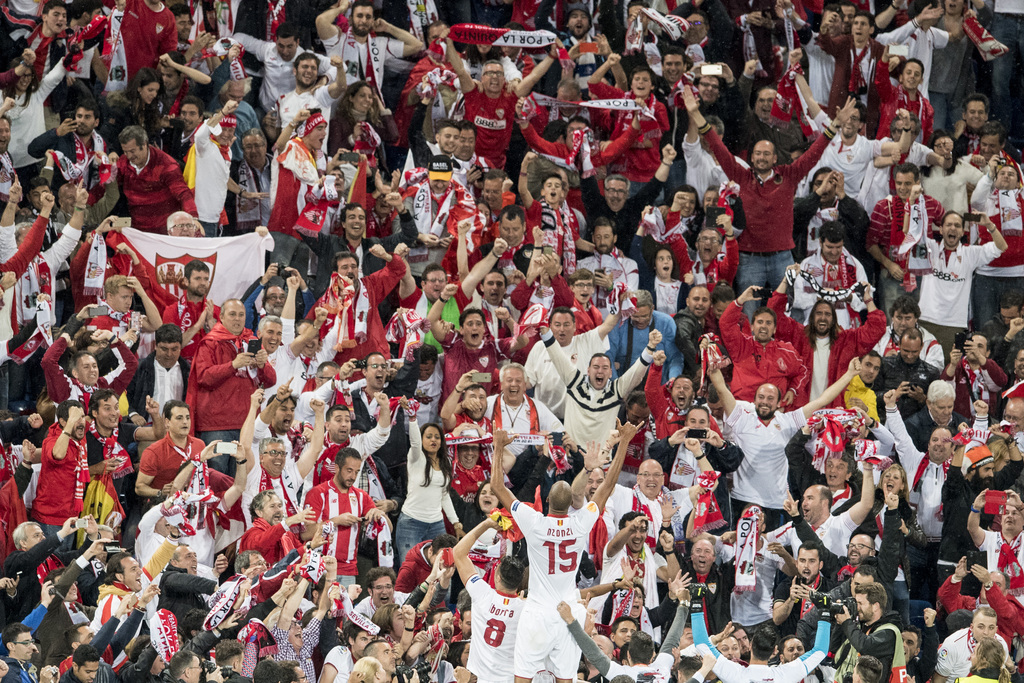 Sevilla players celebrate after the soccer Europa League final between England's Liverpool FC and Spain's Sevilla Futbol Club at the St. Jakob-Park stadium in Basel, Switzerland, on Wednesday, May 18, 2016. (Ennio Leanza/Keystone via AP)