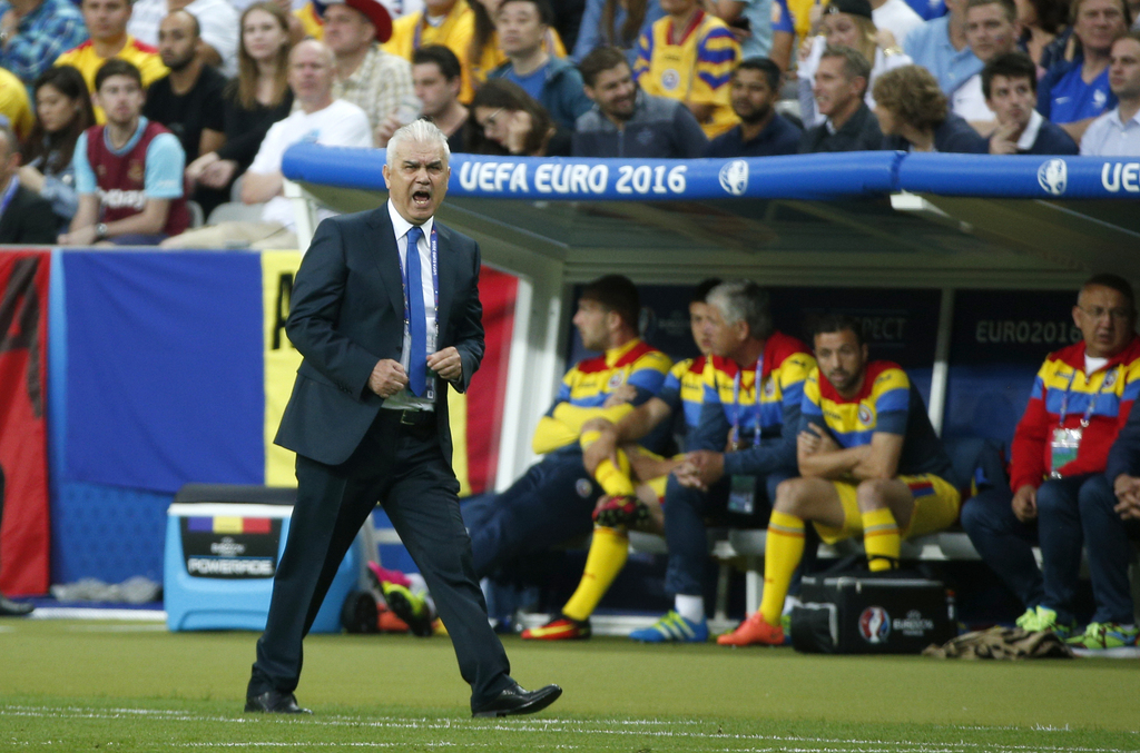 Romania coach Anghel Iordanescu shouts during the Euro 2016 Group A soccer match between France and Romania, at the Stade de France, in Saint-Denis, north of Paris, Friday, June 10, 2016. (AP Photo/Thibault Camus)