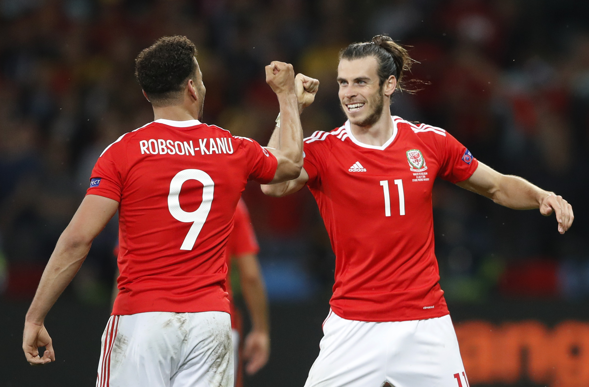 Football Soccer - Wales v Belgium - EURO 2016 - Quarter Final - Stade Pierre-Mauroy, Lille, France - 1/7/16 Wales' Hal Robson-Kanu celebrates with Gareth Bale after scoring their second goal REUTERS/Carl Recine Livepic