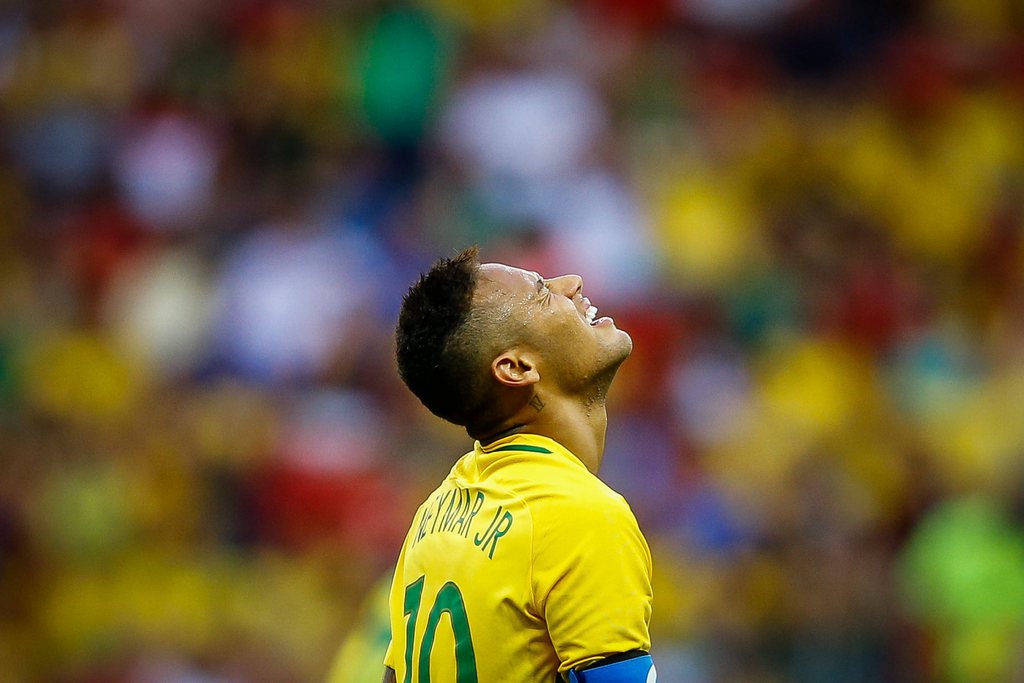 epa05455631 Neymar of Brazil reacts during the men's preliminary round match between Brazil and South Africa for the Rio 2016 Olympic Games Soccer tournament at Mane Garrincha stadium in Brasilia, Brazil, 04 August 2016. EPA/FERNANDO BIZERRA JR.