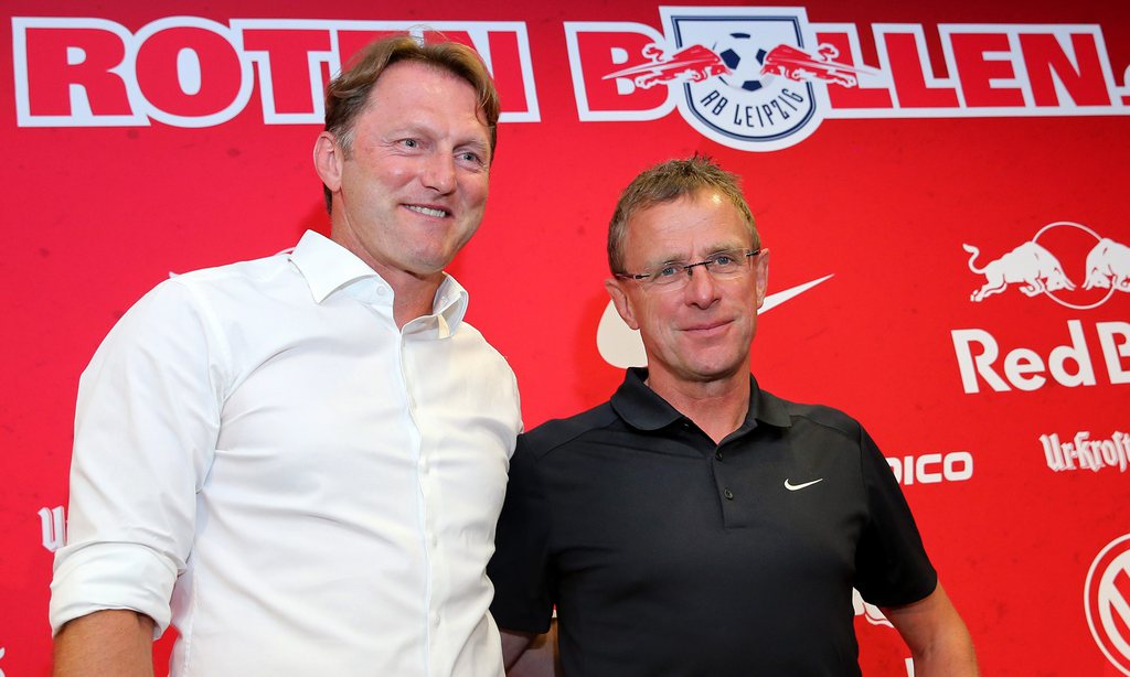 epa05420558 Ralph Hasenhuettl (L), new head coach of German Bundesliga soccer club RasenBallsport Leipzig, poses next to sports director Ralf Rangnick after a press conference held in the Red Bull training centre in Leipzig, Germany, 11 July 2016. Hasenhuettl has signed a three-year contract with the club. EPA/JAN WOITAS