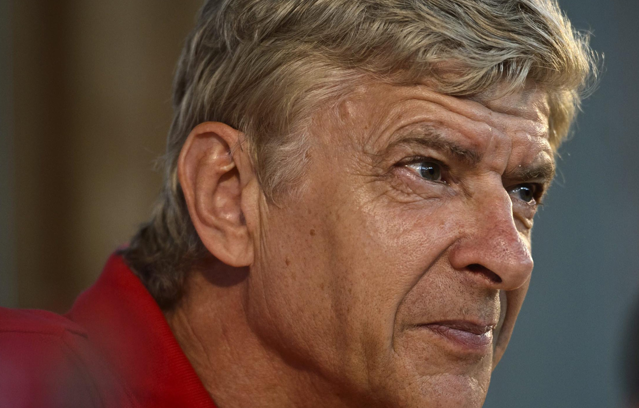 Arsenal's Manager Arsene Wenger attends a news conference at the Helsinki airport in Vantaa on August 9, 2013. Manchester City and Arsenal will play their pre-season's last training match at the Helsinki Olympic Stadium on Saturday. REUTERS/Roni Rekomaa/Lehtikuva (FINLAND - Tags: SPORT SOCCER) THIS IMAGE HAS BEEN SUPPLIED BY A THIRD PARTY. IT IS DISTRIBUTED, EXACTLY AS RECEIVED BY REUTERS, AS A SERVICE TO CLIENTS. NO THIRD PARTY SALES. NOT FOR USE BY REUTERS THIRD PARTY DISTRIBUTORS. FINLAND OUT. NO COMMERCIAL OR EDITORIAL SALES IN FINLAND