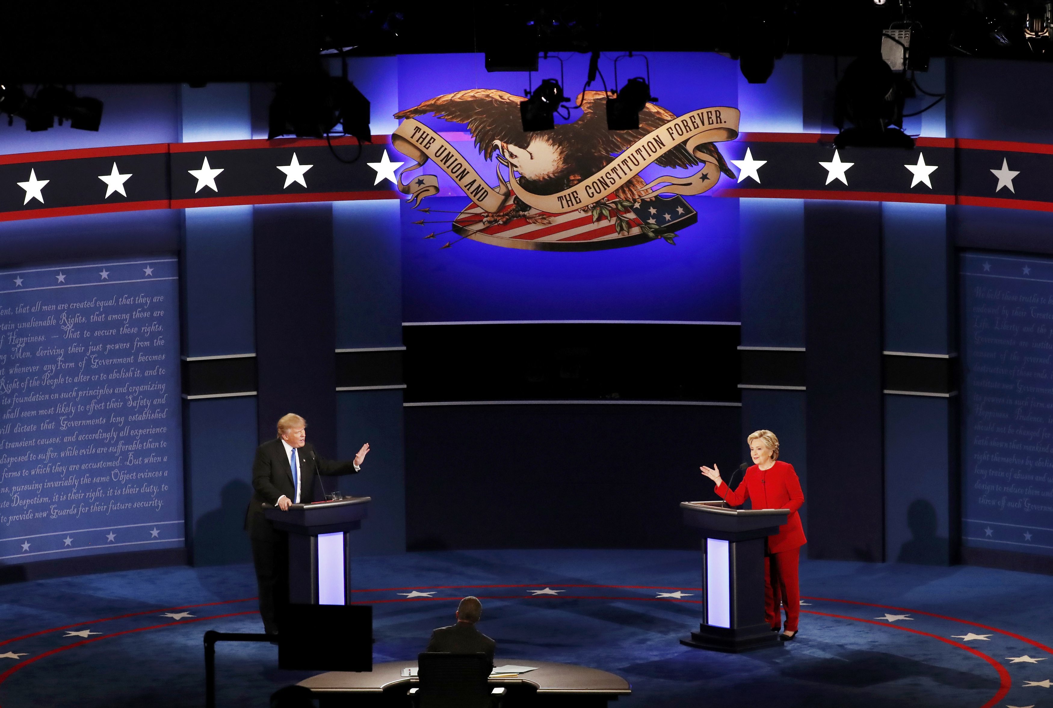 Republican U.S. presidential nominee Donald Trump and Democratic U.S. presidential nominee Hillary Clinton speak during their first presidential debate at Hofstra University in Hempstead, New York, U.S., September 26, 2016. REUTERS/Adrees Latif