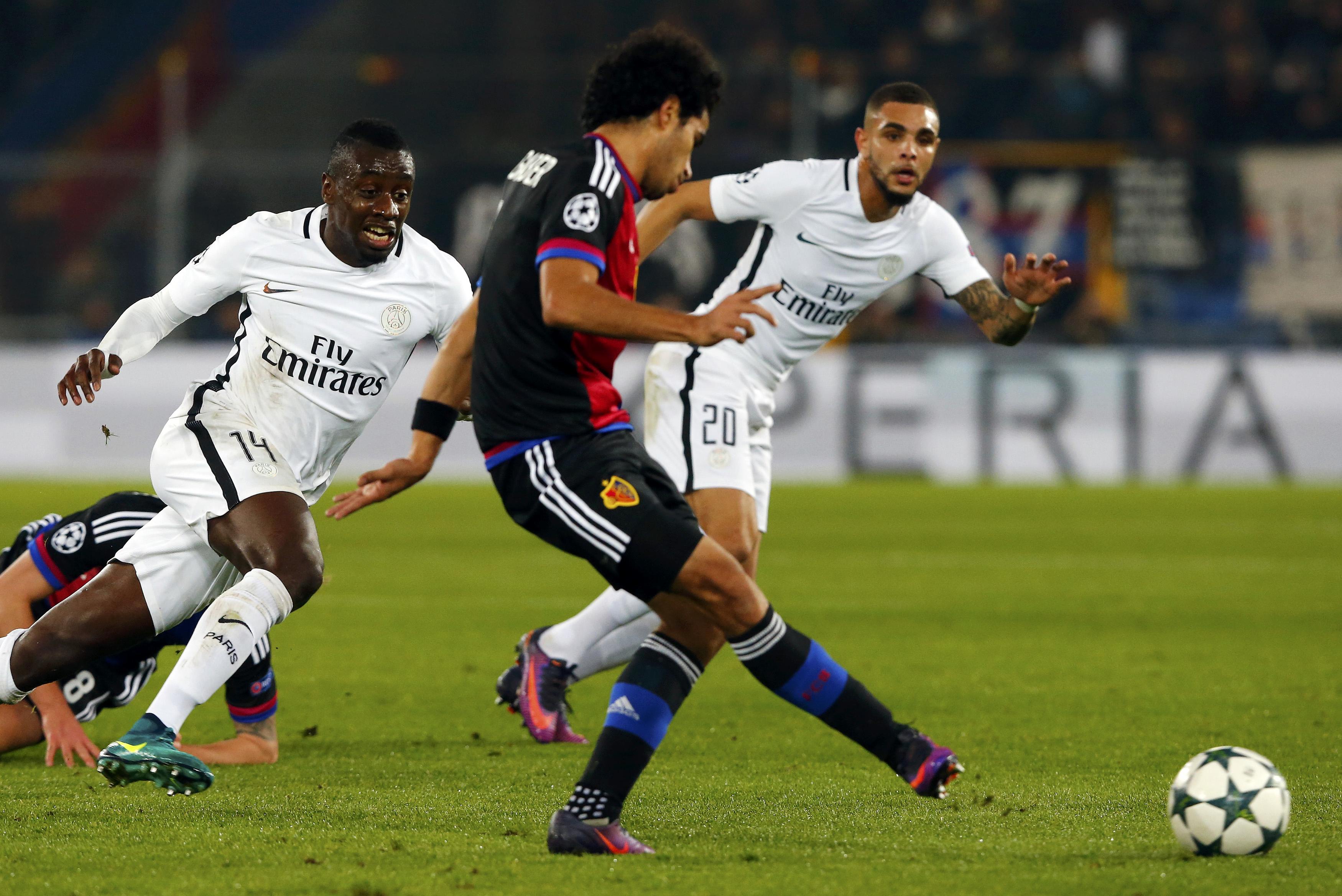 Football Soccer - Basel v Paris St Germain - Champions League group stage - Group A - St. Jakob-Park, Basel, Switzerland - 01/11/16 Basel's Marek Suchy, Paris St Germain's Blaise Matuidi and Layvin Kurzawa in action REUTERS/Arnd Wiegmann