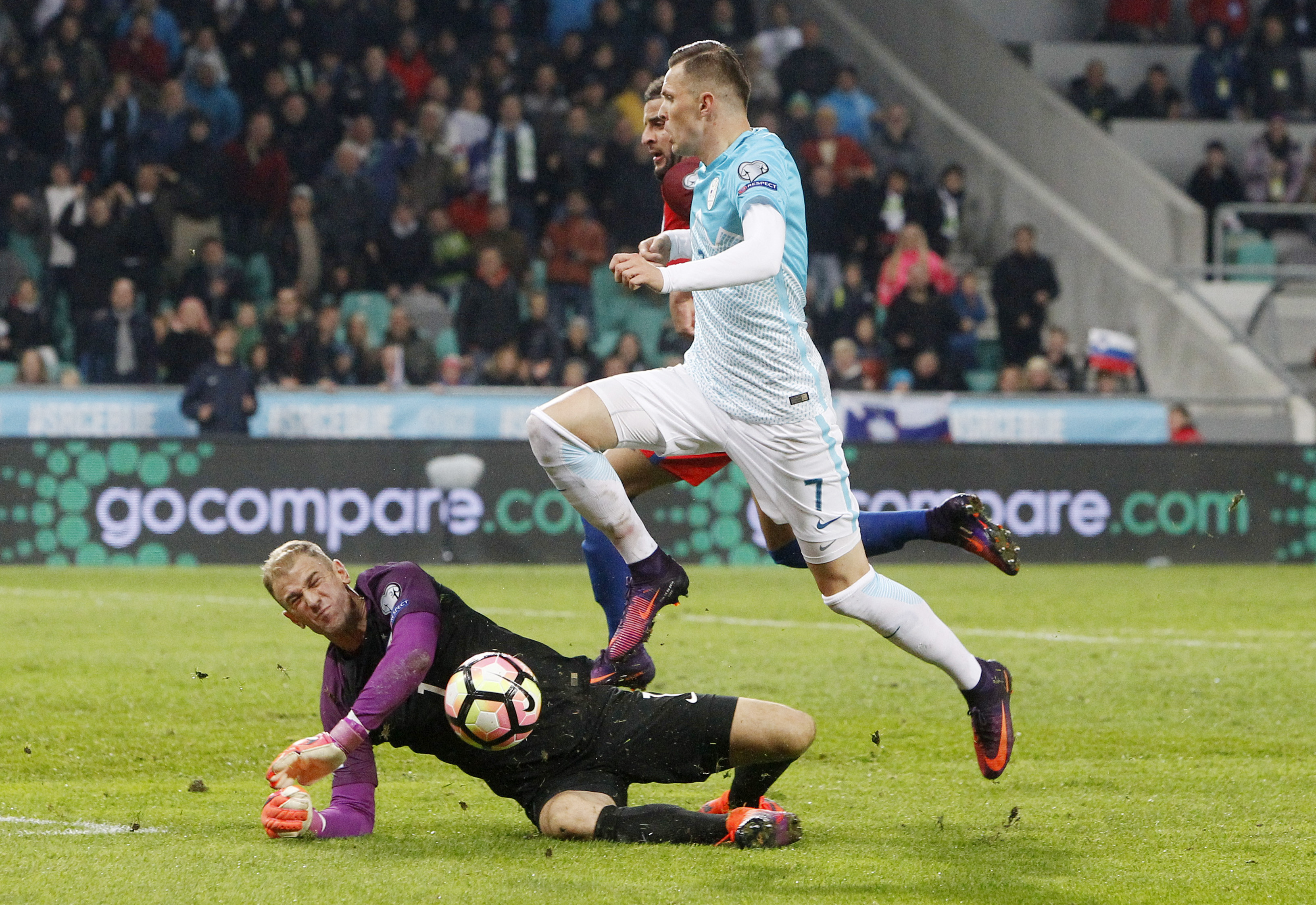 Football Soccer - Slovenia v England - 2018 World Cup Qualifying European Zone - Group F - Stadion Stozice, Ljubljana, Slovenia - 11/10/16 Slovenia's Josip Ilicic in action with England's Joe Hart Reuters / Srdjan Zivulovic Livepic EDITORIAL USE ONLY.