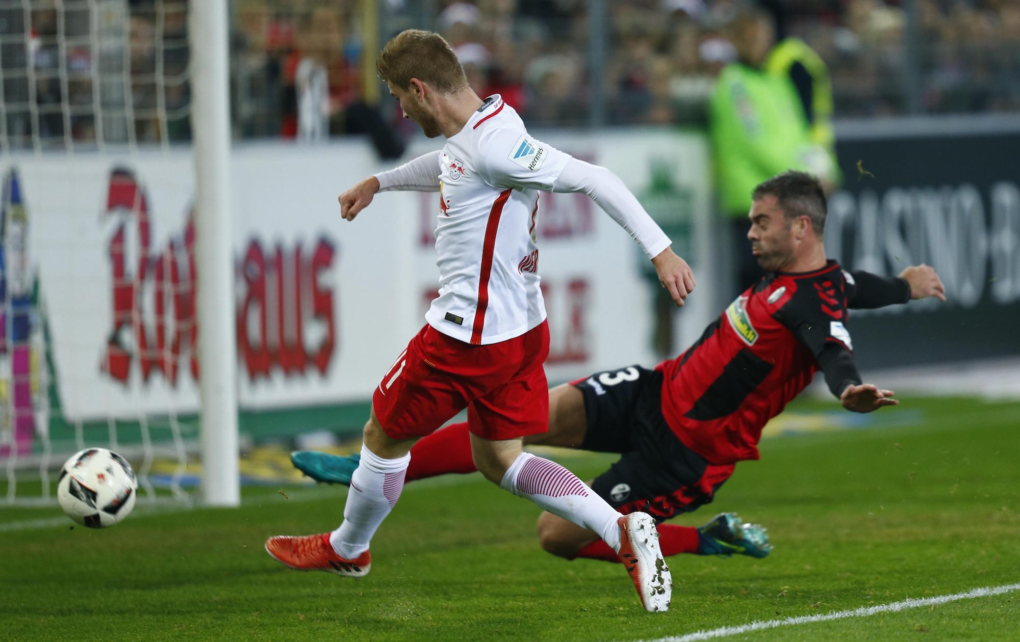 Football Soccer - SC Freiburg v RB Leipzig - German Bundesliga - Schwarzwald Stadion, Freiburg, Germany - 25/11/16 - Leipzig's Timo Werner scores a goal. REUTERS/Ralph Orlowski DFL RULES TO LIMIT THE ONLINE USAGE DURING MATCH TIME TO 15 PICTURES PER GAME. IMAGE SEQUENCES TO SIMULATE VIDEO IS NOT ALLOWED AT ANY TIME. FOR FURTHER QUERIES PLEASE CONTACT DFL DIRECTLY AT + 49 69 650050.