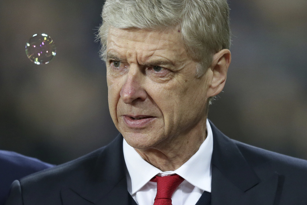 Arsenal Manager Arsene Wenger during the English Premier League soccer match between West Ham United and Arsenal at The London Stadium in London, Saturday Dec. 3, 2016. (AP Photo/Tim Ireland)