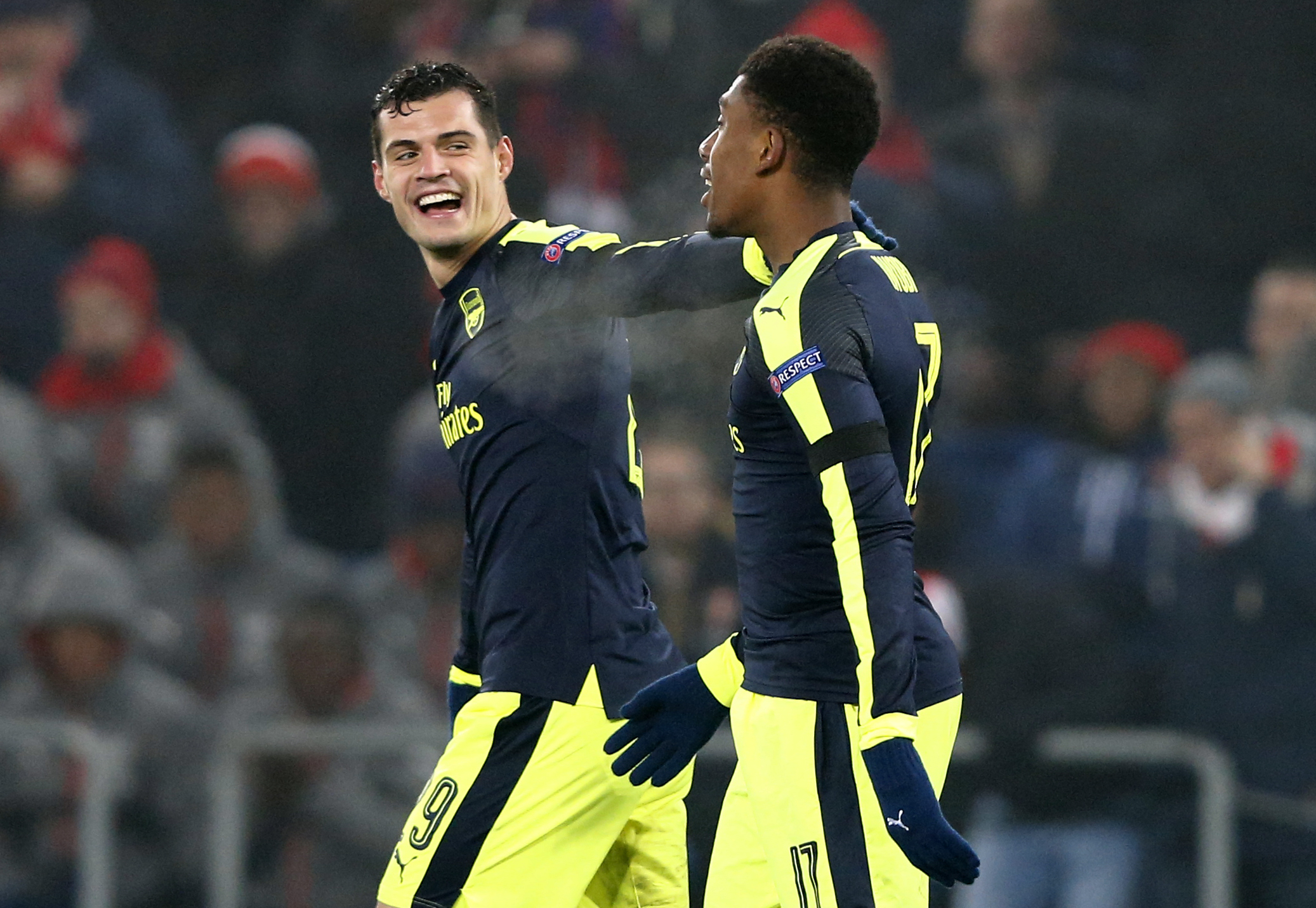 Football Soccer - FC Basel v Arsenal - UEFA Champions League Group Stage - Group A - St.Jakob-Park, Basel, Switzerland - 6/12/16 Arsenal's Alex Iwobi celebrates scoring their fourth goal with Granit Xhaka Reuters / Arnd Wiegmann Livepic EDITORIAL USE ONLY.