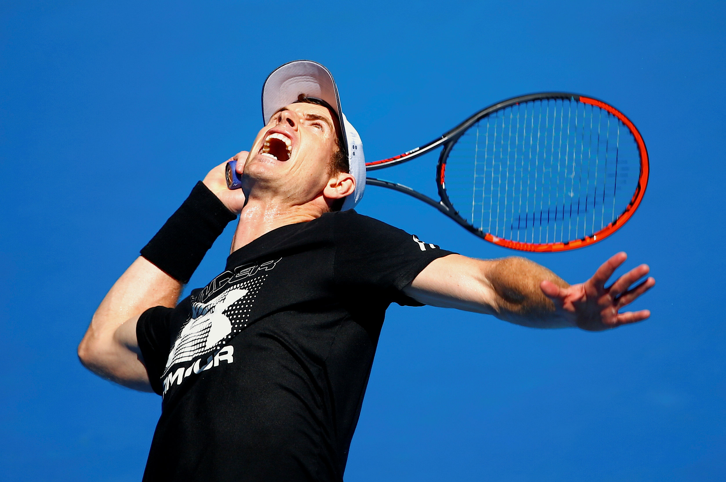 Britain's Andy Murray serves during a training session ahead of the Australian Open tennis tournament in Melbourne, Australia, January 12, 2017. REUTERS/David Gray