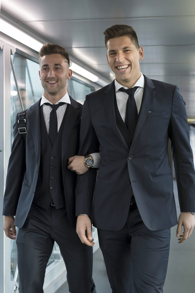 Andraz Sporar, left, and goalkeeper Djordje Nikolic, right, of Switzerland's FC Basel 1893 on their departure at the EuroAirport in Basel, Switzerland, on Tuesday, November 22, 2016. Switzerland's FC Basel 1893 is scheduled to play an UEFA Champions League Group stage Group A matchday 5 soccer match against Bulgaria's PFC Ludogorets Razgrad on Wednesday, November 23, 2016. (KEYSTONE/Georgios Kefalas)
