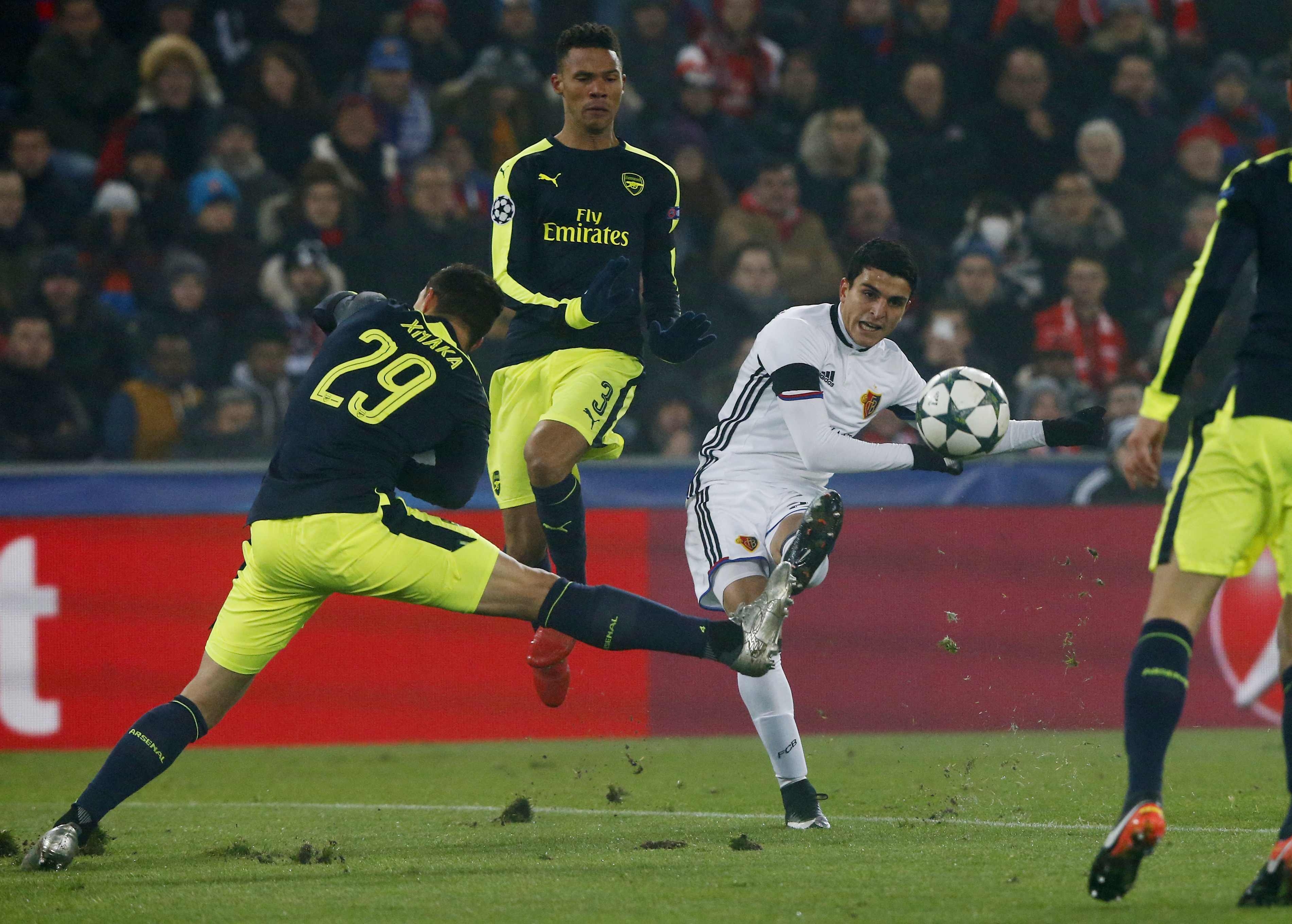 Football Soccer - FC Basel v Arsenal - UEFA Champions League Group Stage - Group A - St.Jakob-Park, Basel, Switzerland - 6/12/16 Arsenal's Kieran Gibbs in action with FC Basel's Mohamed Elyounoussi Reuters / Arnd Wiegmann Livepic EDITORIAL USE ONLY.