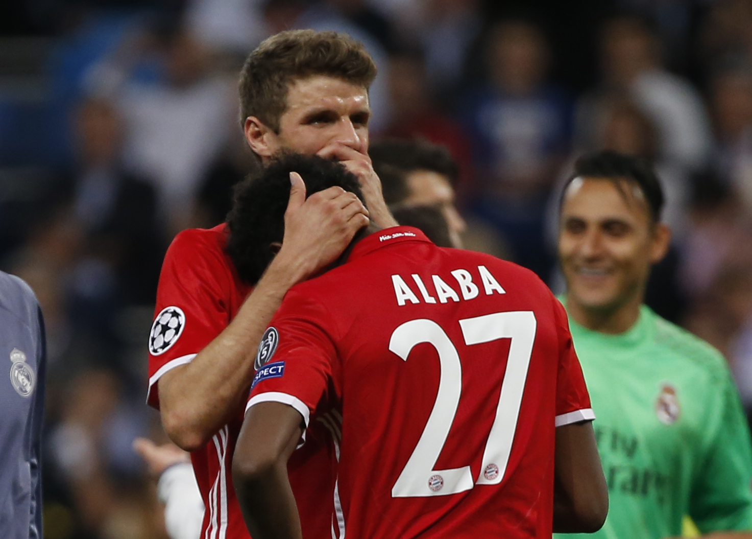 Football Soccer - Real Madrid v Bayern Munich - UEFA Champions League Quarter Final Second Leg - Estadio Santiago Bernabeu, Madrid, Spain - 18/4/17 Bayern Munich's Thomas Muller and David Alaba look dejected after the game Reuters / Susana Vera Livepic