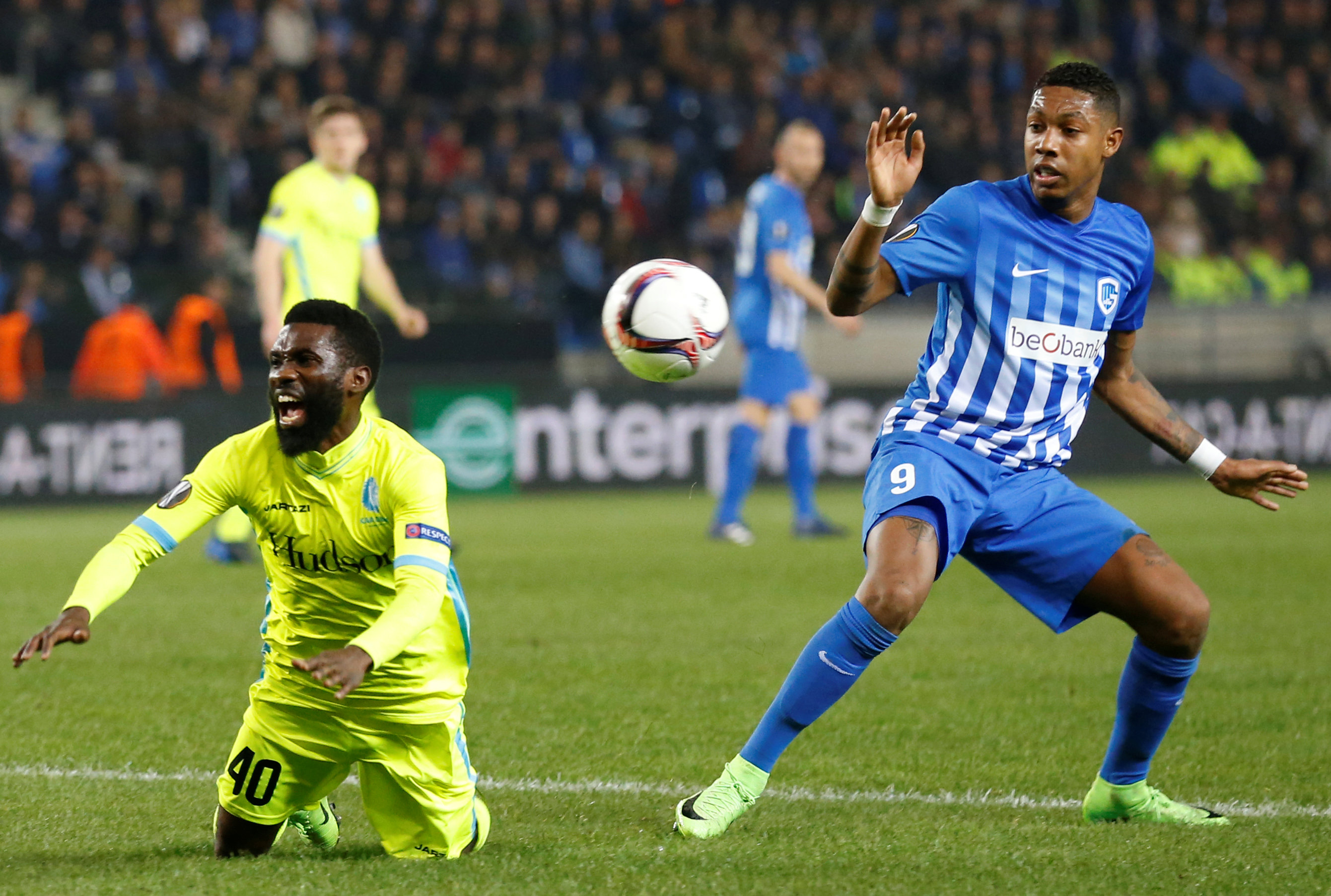Football Soccer - KRC Genk v K.A.A. Gent - UEFA Europa League Round of 16 Second Leg - Luminus Arena, Genk, Belgium - 16/3/2017 KRC Genk's Jean-Paul Boetius in action against K.A.A. Gent's Rabiu Ibrahim. REUTERS/Francois Lenoir