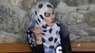 ATTENTION EDITORS - VISUAL COVERAGE OF SCENES OF INJURY OR DEATH    A woman sits outside a hospital after a blast in Kabul, A