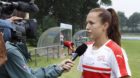 Switzerland's midfielder Lia Waelti speaks to a TV reporter, after a training session of the national soccer team of Switzerl