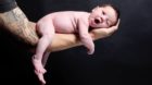 (GERMANY OUT) Newborn baby on the fahther's arm  (Photo by JOKER / Alexander Stein/ullstein bild via Getty Images)