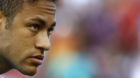 Barcelona's Neymar walks on the field before an International Champions Cup soccer match against Manchester United, Wednesday
