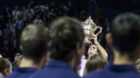 Switzerland's Roger Federer reacts with the trophy after winning the final match against Argentina's Juan Martin del Potro at