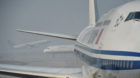 BEIJING, CHINA - DECEMBER 23:  (CHINA OUT) Planes sit at Beijing International Airport in heavy smog on December 23, 2015 in 