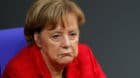 German Chancellor Angela Merkel reacts as she attends a session of the Bundestag in Berlin, Germany, November 21, 2017. REUTE