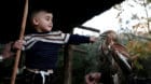 A Palestinian boy plays with a falcon in the West Bank town of Tubas December 3, 2017. Picture taken December 3, 2017. REUTER