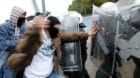 BKCTMX Violence against police officers. Exercise of an anti riot police unit. Violent demonstrators attacks police forces.. 