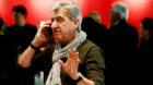 FILE PHOTO: CEO and Chairman of the Board of the Swatch Group Nick Hayek Jr. uses a mobile phone at the Baselworld Watch and 
