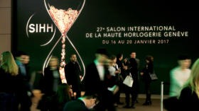 FILE PHOTO: Visitors arrive at the Salon International de la Haute Horlogerie (SIHH) watch fair in Geneva, Switzerland, Janua